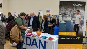 Student learns about career options and opportunities at Gildan during 2019 Career Expo at Davie County High School