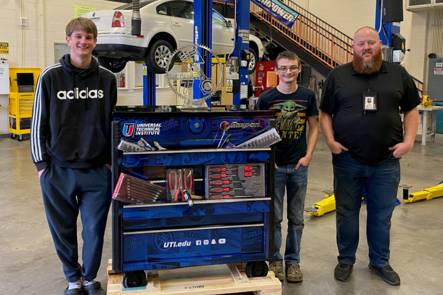 (L to R) Jonah Longworth, Zachary Blalock, and Seth James show off the trophy, toolbox, and tools won at the Top Tech Challenge at UTI/NASCAR Insitute in Mooresville