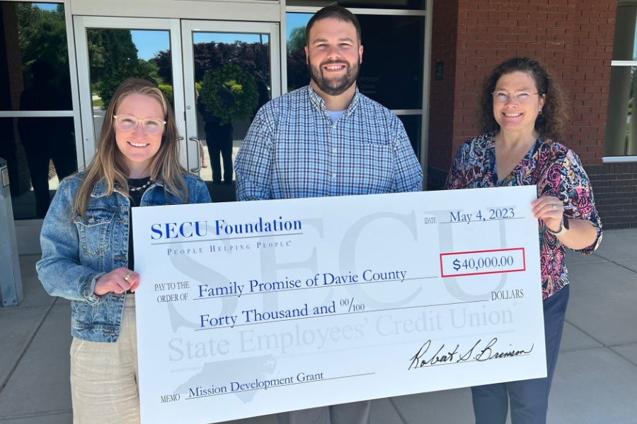Family Promise of Davie Country received a $40,000 grant from the North Carolina State Employee Credit Union Foundation. (L to R) Lisa Reynolds, FPDC Executive Director; Adam Ridenhour, FPDC Trustee and Immediate Past Chair; and Beth Edwards, FPDC Trustee. The check was presented at the SECU branch in Bermuda Run. 
